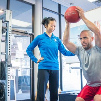 personal trainer with client